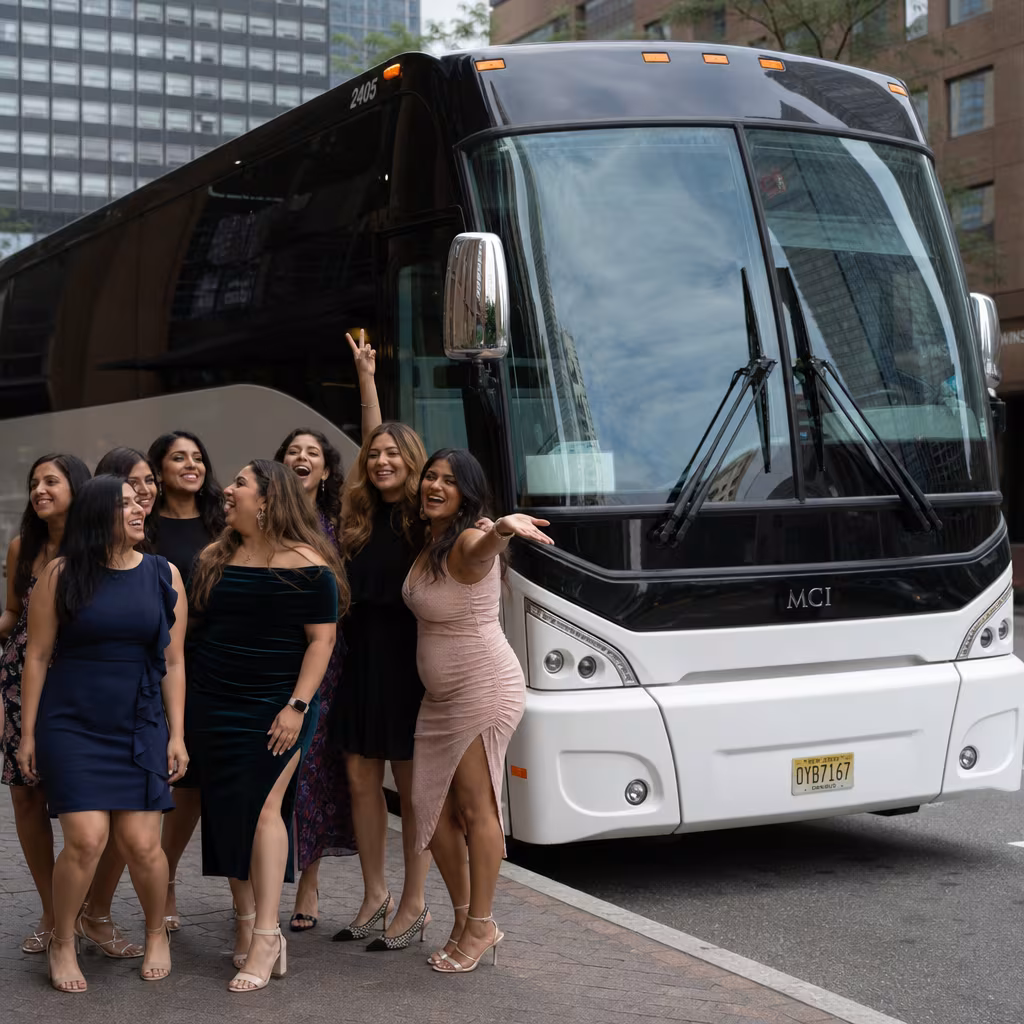 Passengers loading luggage while boarding an Baton Rouge group shuttle