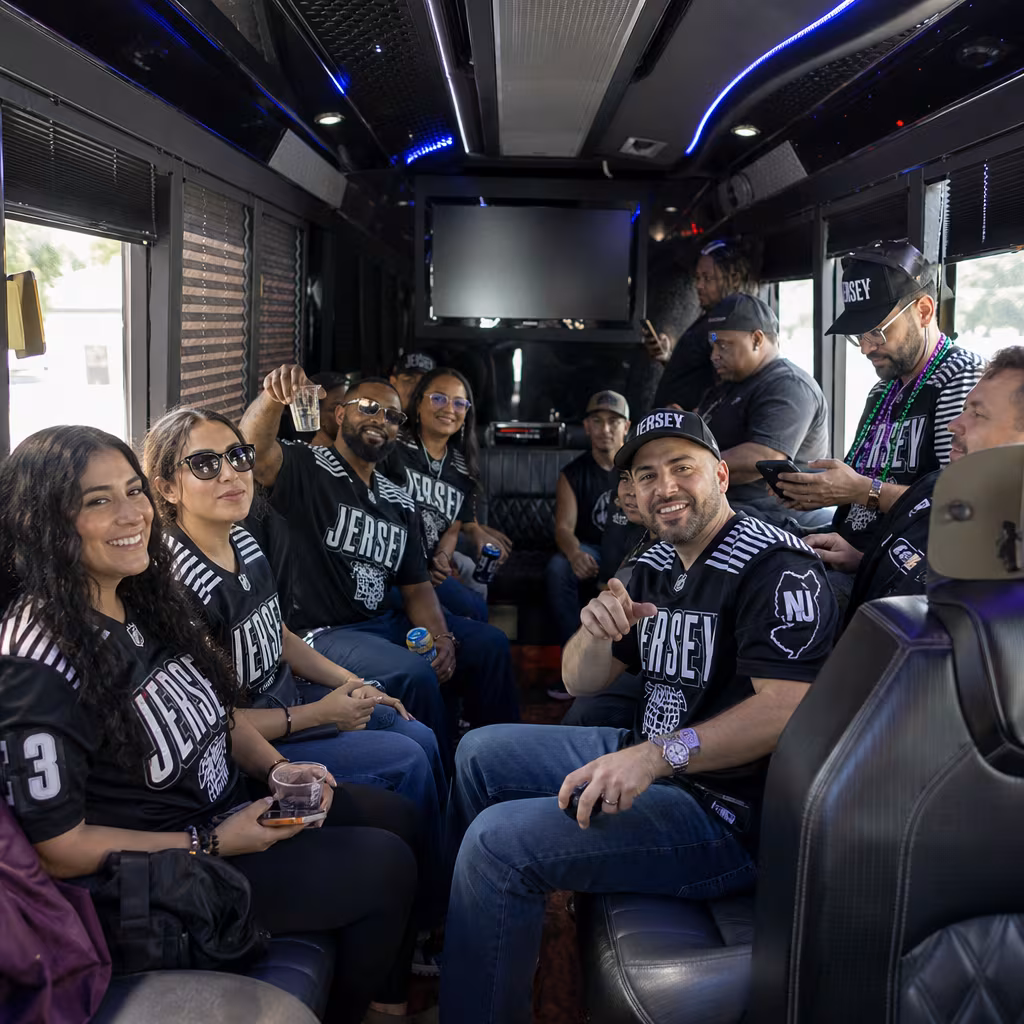Group boarding a white charter bus for Sporting Event Transportation transportation in Baton Rouge